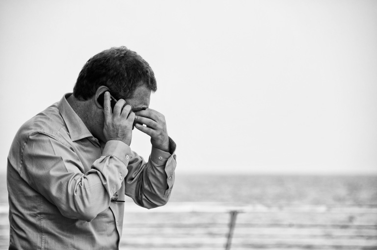 Worried man on phone